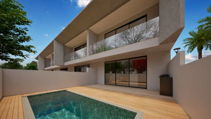 Pátio posterior de uma moradia com piscina privativa