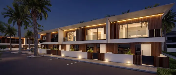 Conjunto de moradias com iluminação arquitetónica noturna